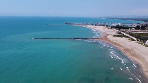 Paragliding over the Mediterranean Sea coast, Valencia, Spain