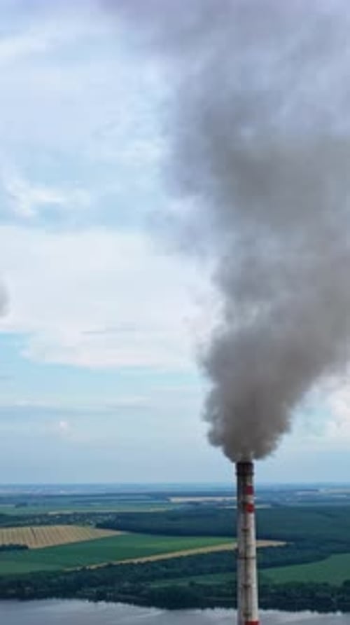 Atmospheric air pollution from industrial smoke. Pipes with chemical smoke from industrial plant