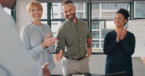 Colleagues Shake Hands After Successful Negotiation