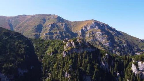 Unveiling the Majestic Beauty of a Limestone Mountain Peak- A Stunning Aerial Footage with the Vast
