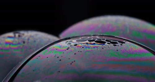 Iridescent Soap Bubbles with Swirling Colors Close-Up
