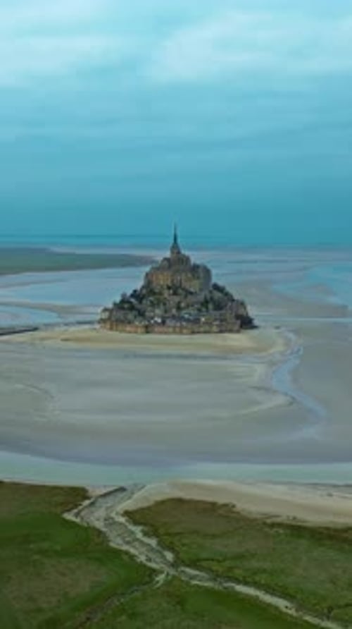 Aerial View of the Famous Historic Abbey Mont Saint Michel Historic Monastery with Tidal Flats