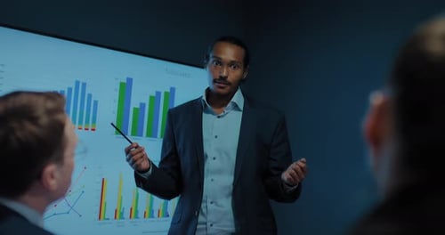 Portrait of Black SMM Specialist Speaking in Office Meeting Expert of Marketing Prores