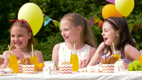 Children at a fun outdoor birthday party