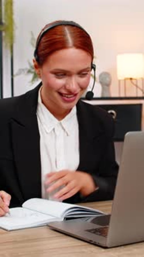 Young Adult Woman Attends a Video Conference