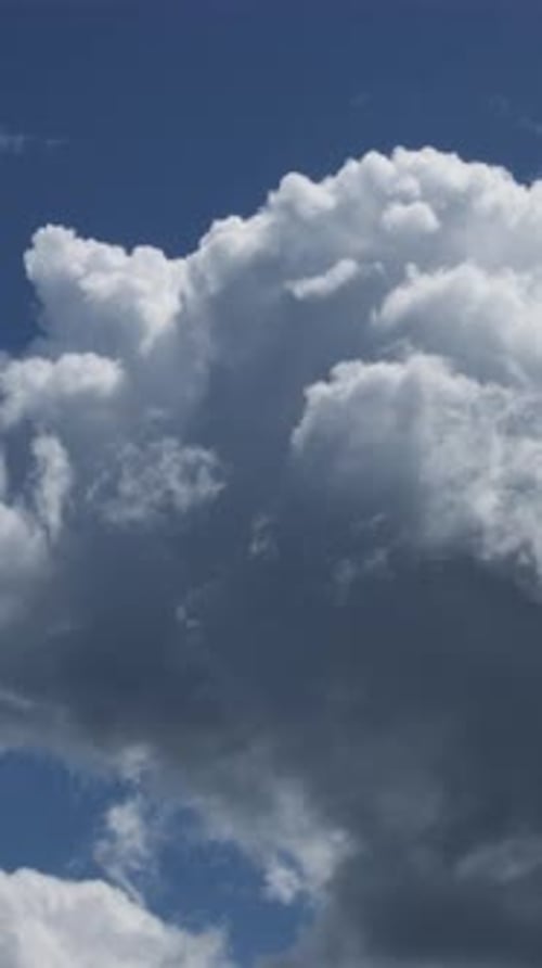 Clouds Moving Across a Blue Sky