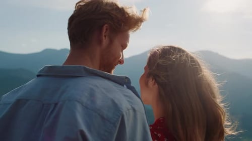 Smiling Couple Look Mountains Landscape View. Happy Lovers Enjoy Hike Outdoors Back