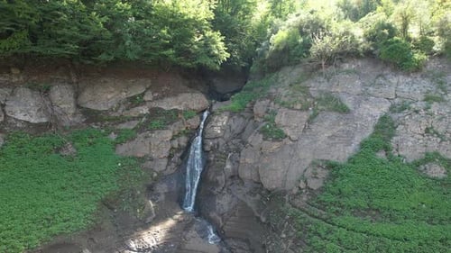 Aerial Waterfall Among Rocks