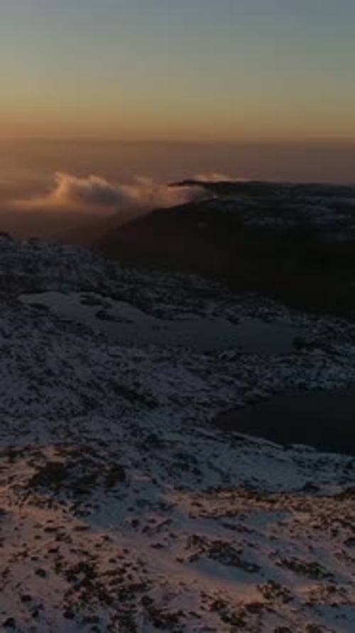 Snowy Mountains Aerial View at Sunrise