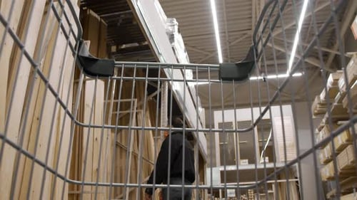 Guy Parks Cart By Lumber Aisle for Couple Shopping