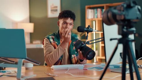 Influencer, microphone and camera with man in studio for content creator, advice or broadcast