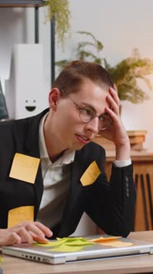 Tired Exhausted Businessman with Laptop Sticky Notes with Many Tasks Sitting at Home Office Desk