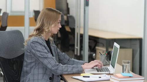 Young Woman Working at Modern Office