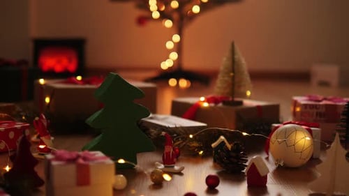 Decorated Christmas Gifts Under Tree with String Lights