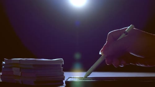 Barrower signs a digital contract for a cash loan - concept: interest rate, loan shark, crippling de