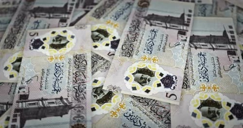 Libya Dinar growing pile of money seamless loop