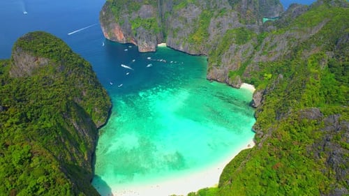 Aerial view over paradise island in tropical sea.