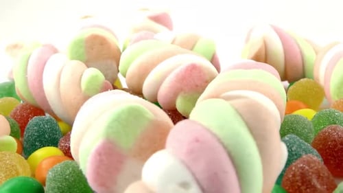 Pile of Colorful Striped Marshmallows and Candies