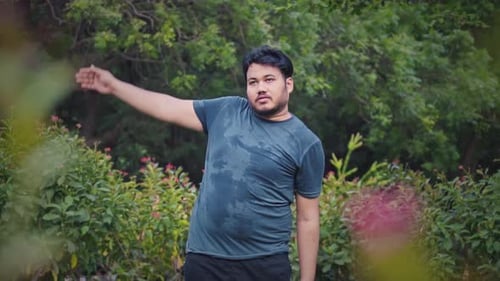 Young Adult Male Stretching Outdoors