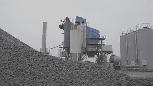 Granite Grains Heap Against Crushing Plant in Mining Pit