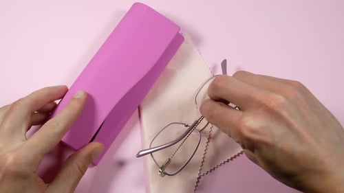 Stylish Eyeglasses Being Removed From Case