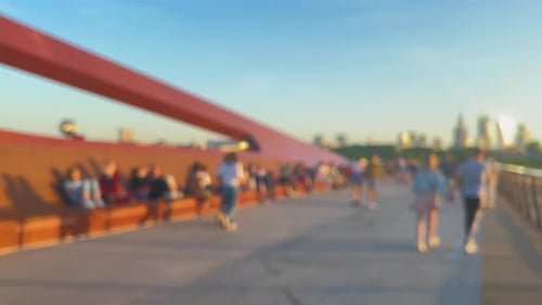 Bicycle and pedestrian bridge over the Vistula. Warsaw, Poland. People take selfies and take picture