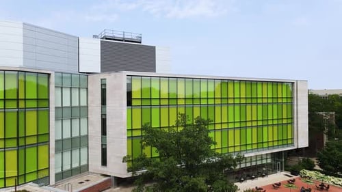 Pan of the new additon of Wells Hall at Michigan State University from the air.