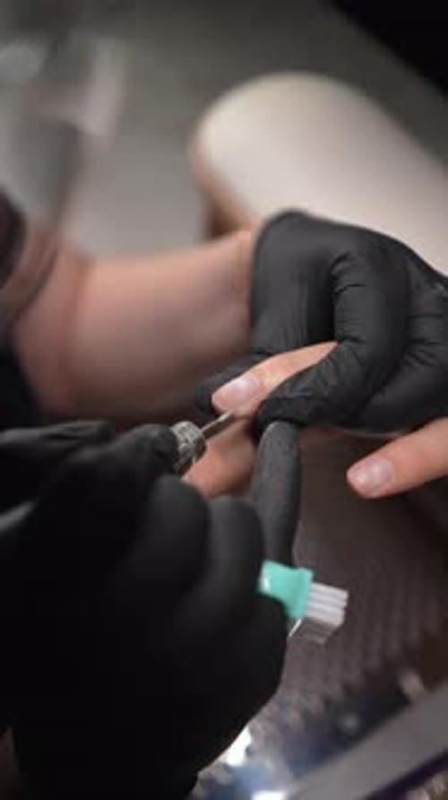 Fingernail Filing at Manicure Salon