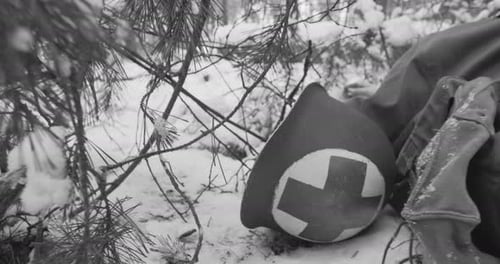 Corpsman Helmet Lies Near Fallen Soldier Metal Helmet Of United States Army Infantry Medic Soldier
