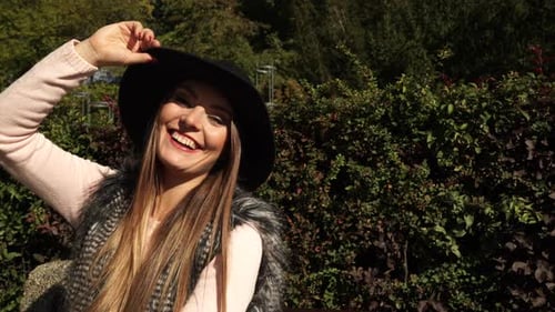 Fashion Woman Relaxing In Park
