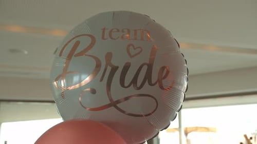 Shinning white color balloon of team bridge, close up motion shot