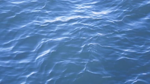 Gentle Waves Rippling in the Blue Ocean Water
