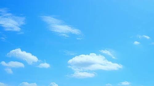 Time-Lapse of Clouds Drifting Across a Blue Sky