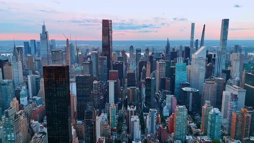 Urban dense scenery of Manhattan. High-rise panorama of New York, USA at sunset.