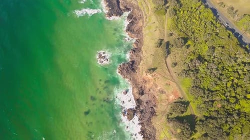 Aerial view of waves along the wild coastline, South Pacific, Australia.