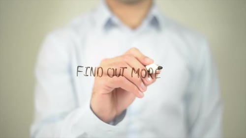 Hand Writing "Find Out More" in Script