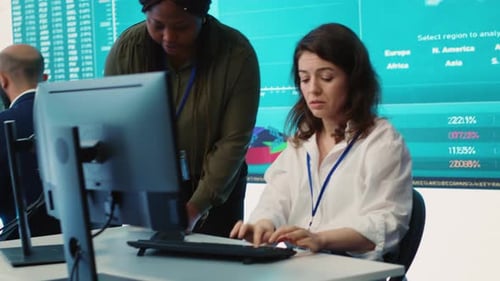 Business Associates Comparing Key Performance Indicators Within the Firm