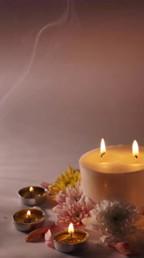 Candles and Flowers Glowing in Soft Light