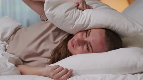 Woman Gets Irritated Hearing Noise From Neighbors in Room