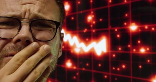 Shocked investor reacting to market crash and falling stock prices