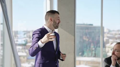 Performing ideas in front of the colleagues. Chart presentation to the office team.