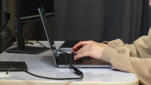 A programmer busy at work on their computer
