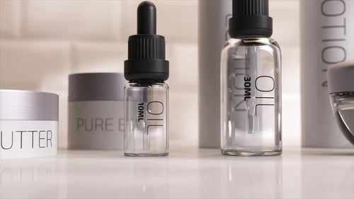 Minimalist Beauty Products Showcase with Smooth Camera Pan