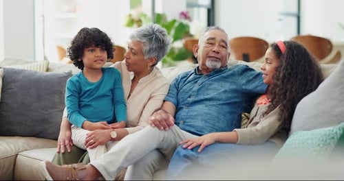 Family Spending Time Together On Couch Indoors