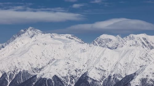 Winter Mountain Landscape Majestic Panorama of Snowcovered Caucasus Mountains Showcasing Stunning