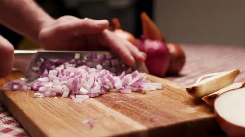 Dicing Red Onion on Wooden Cutting Board