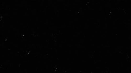 Bruit et taches dus au grain du film à faible densité (15 s)