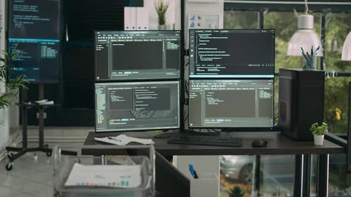 Empty Data Room with Computer Screens on Desk
