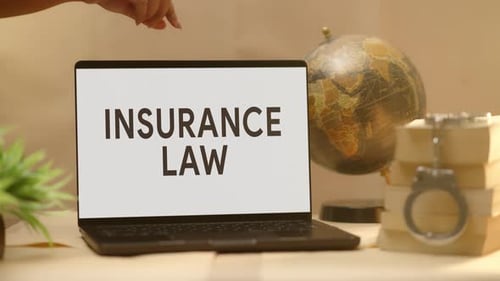 Insurance Law Displayed on a Laptop Screen