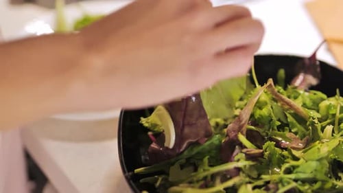 Person Organizing Fresh Salad Greens - A Touch of Craft and Elegance, Close Up 4K